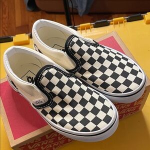 Vans Black and White Checkerboard Slip-Ons